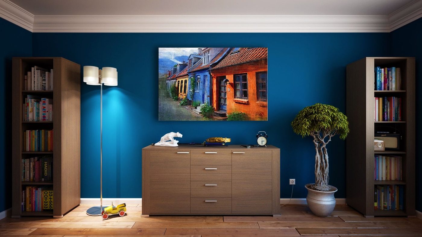 Teal interior with warm wood furniture — atmospheric stock photograph, not a We Do Blinds job.
